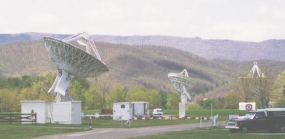 In the foreground, the 13.6 meter radio telescope at NRAO-Green Bank WVa